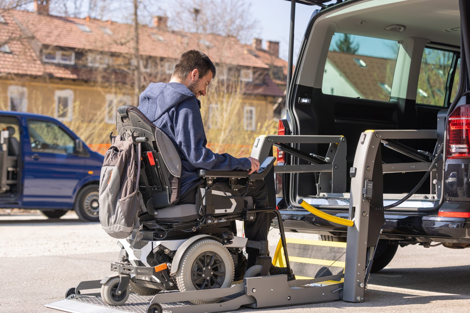 How can I transport an electric wheelchair